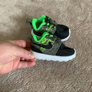 Green and black camo nike sneakers size 3
